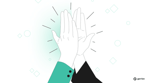 Two hands giving a high-five